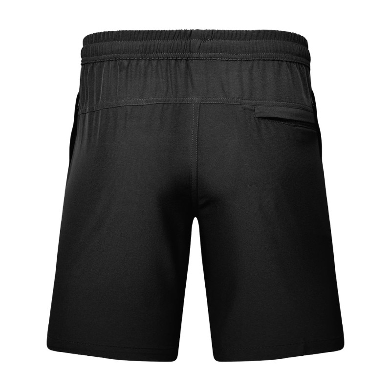 Detail shot of a man wearing comfortable grey-blue KTM CTY Aerfofit half pants, shorts, featuring a secure zip pocket and small side slits at the hem for ease of movement 1