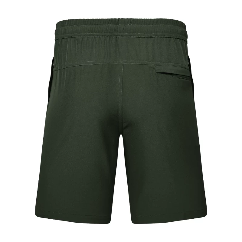 Detail shot of a man wearing comfortable grey-blue KTM CTY Aerfofit half pants, shorts, featuring a secure zip pocket and small side slits at the hem for ease of movement 3