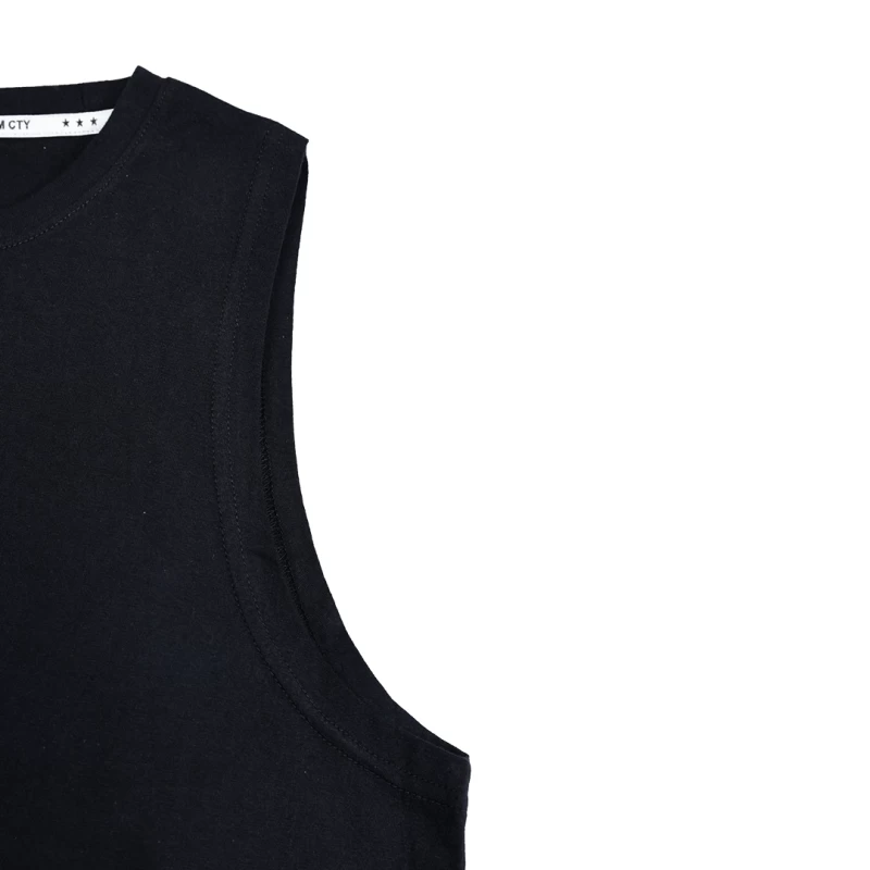A female model in a black tank top and a male model in a brown tank top wearing the unisex KTM CTY Aerolite Tanktop, styled with sunglasses for a casual summer activewear look. 3
