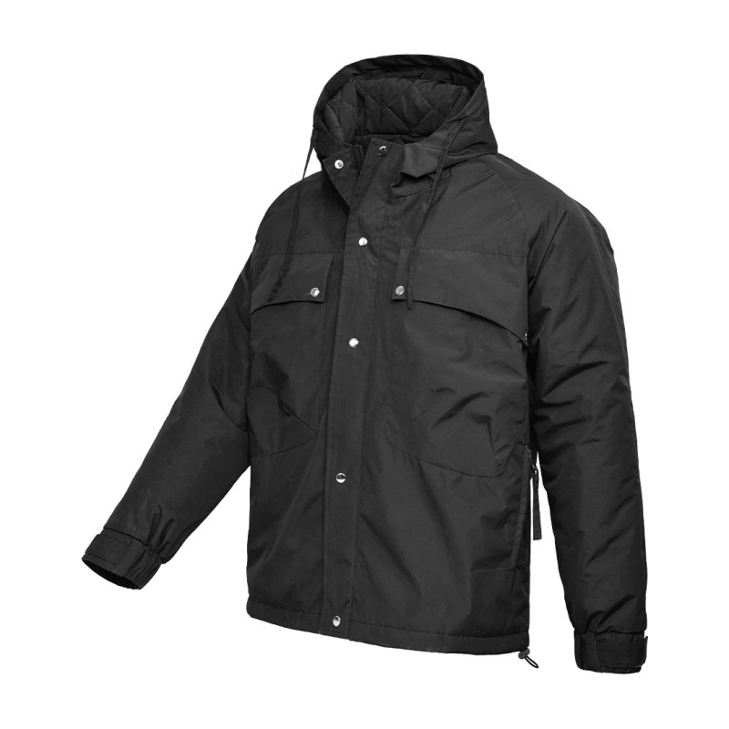A male model wearing sunglasses and a heavy-duty, navy blue KTM CTY Cargo Shield Hoodie Winter Jacket, featuring a thick hood, snap-button front and multiple cargo pockets for cold weather protection. 2