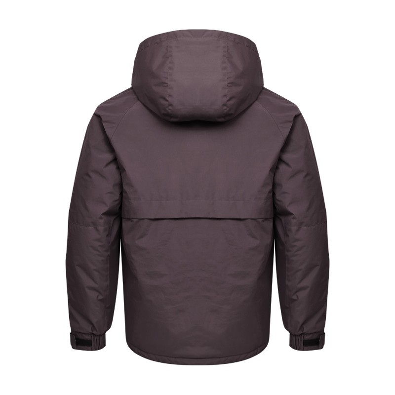 A male model wearing sunglasses and a heavy-duty, navy blue KTM CTY Cargo Shield Hoodie Winter Jacket, featuring a thick hood, snap-button front and multiple cargo pockets for cold weather protection. 5