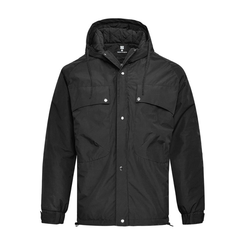 A male model wearing sunglasses and a heavy-duty, navy blue KTM CTY Cargo Shield Hoodie Winter Jacket, featuring a thick hood, snap-button front and multiple cargo pockets for cold weather protection. 1