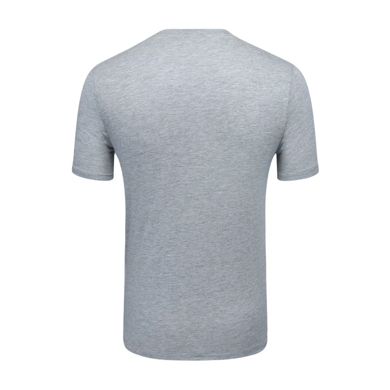 A female and male model standing back-to-back wearing the unisex KTMCTY Core Flex Crew Neck T-Shirt; the woman is wearing light grey and the man is wearing black. 1