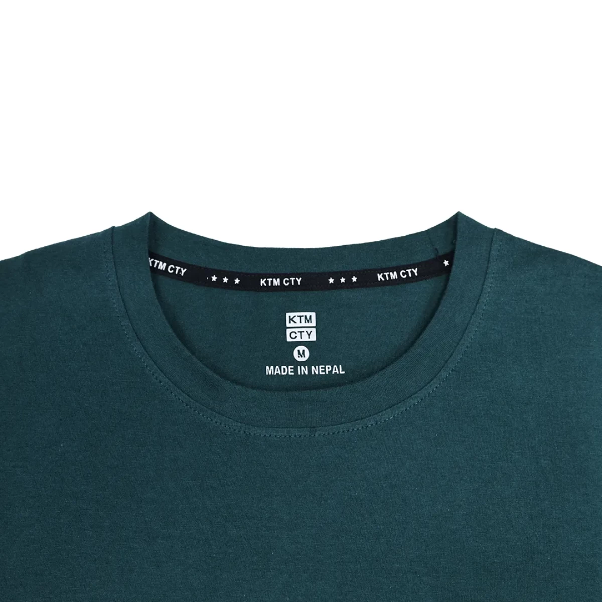 A female model wearing a light grey KTM CTY Core Flex Full Sleeve t-shirt and a male model in the background wearing a dark green version, both styled casually with sunglasses 4
