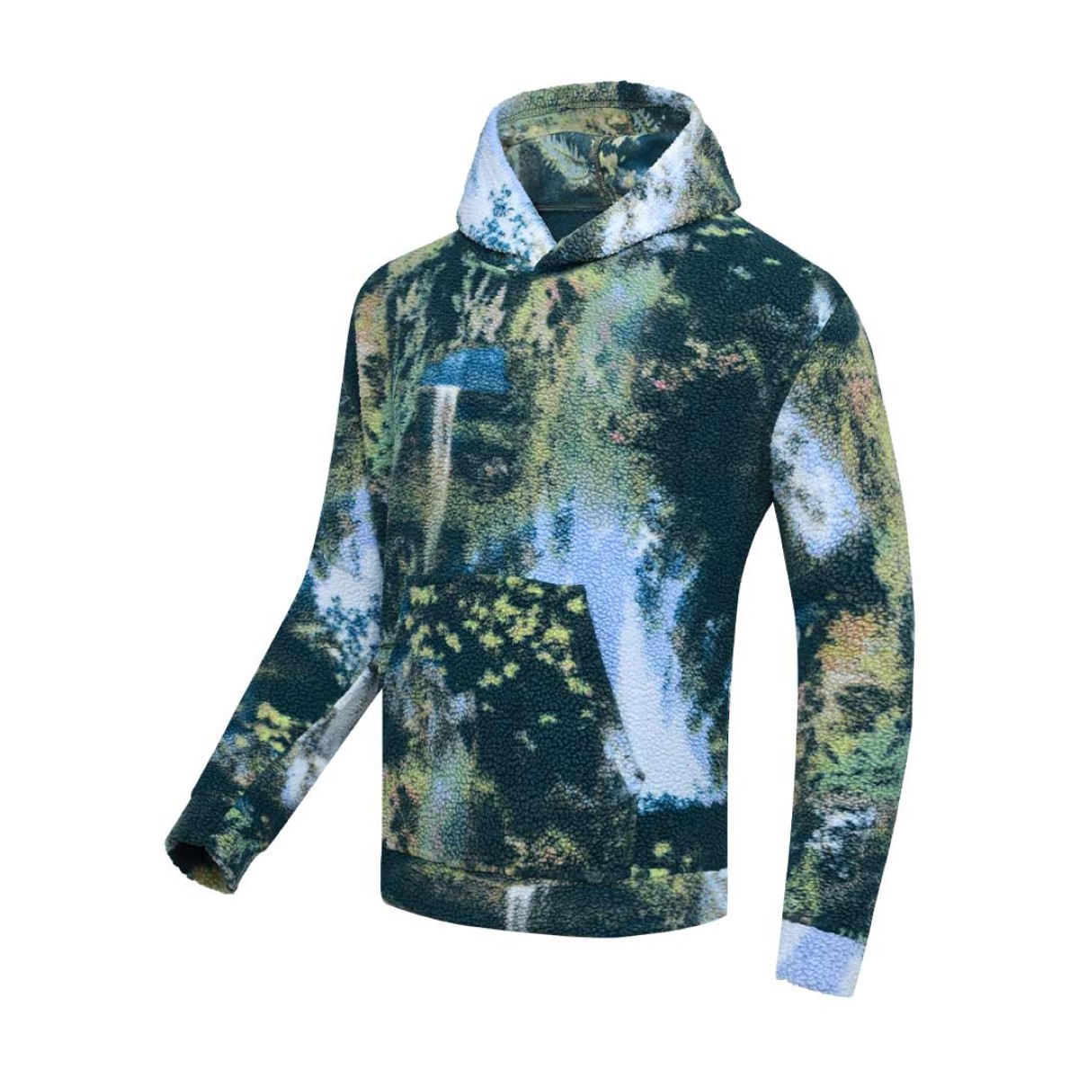Model styling the KTM CTY Oversize Emberprint Sherpa Hoodie, featuring a warm, textured fleece with an earthy brown, green, and cream abstract pattern, oversized fit, with her hands in the front kangaroo pocket 6