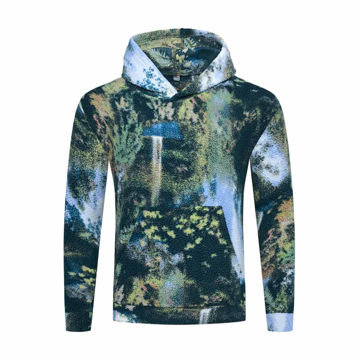 Model styling the KTM CTY Oversize Emberprint Sherpa Hoodie, featuring a warm, textured fleece with an earthy brown, green, and cream abstract pattern, oversized fit, with her hands in the front kangaroo pocket 3