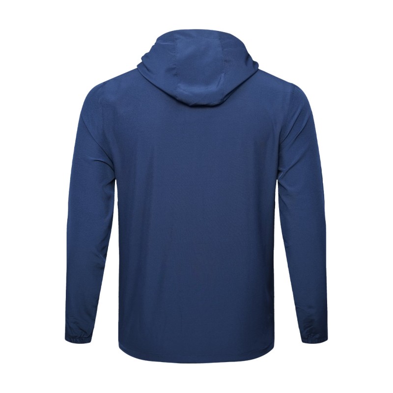 Male model wearing a light grey KTM CTY Swiftlayer Summer Wear Windcheater, a lightweight zip-up Windguard jacket featuring a hood, elastic cuffs, men's windproof windcheater for bike riding 3