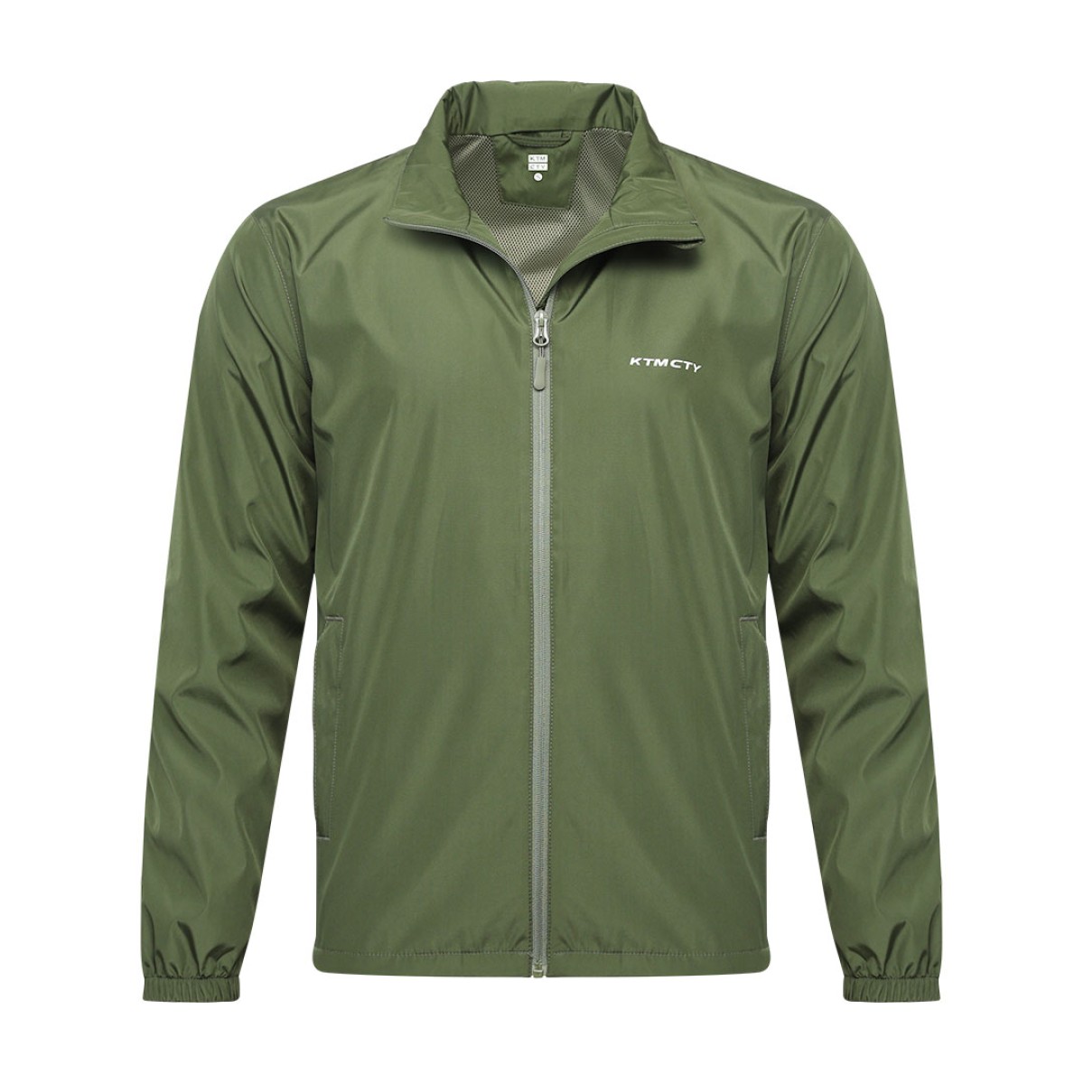 A male model wearing sunglasses looks off to the side while adjusting the collar of his olive green KTM CTY windbreaker, windcheater. The lightweight windguard jacket features a full-zip front, elastic cuffs, and a small white logo on the chest 0