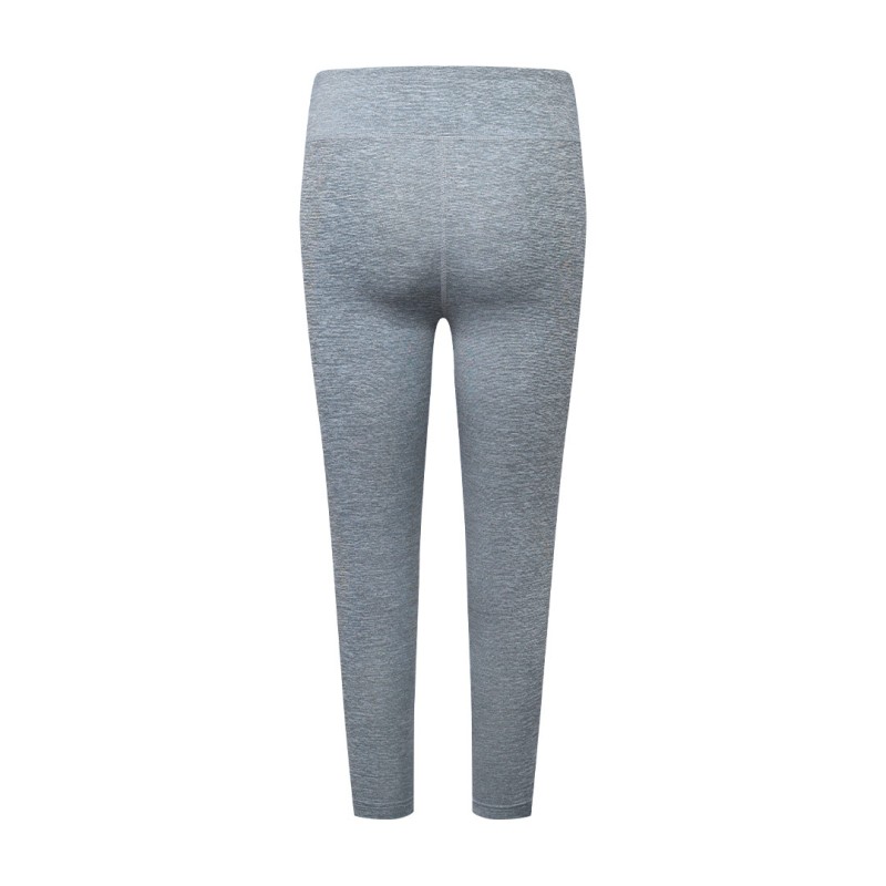 KTM PRO mint green high waisted leggings worn by female model during workout or at gym paired with black crop top and sneakers on white background 7