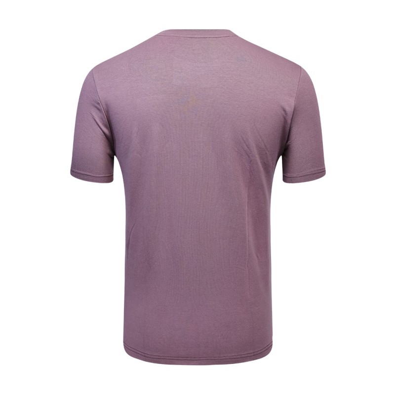 A close-up shot of the mid dark blue green KTMCTY Foundation Tee tshirt. The fine texture of the breathable cotton fabric is visible, along with the clean stitching of this essential summer wear t-shirt. 2