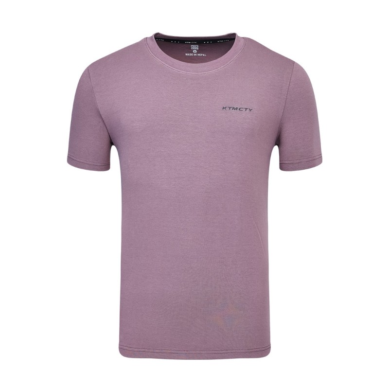 A close-up shot of the mid dark blue green KTMCTY Foundation Tee tshirt. The fine texture of the breathable cotton fabric is visible, along with the clean stitching of this essential summer wear t-shirt. 1