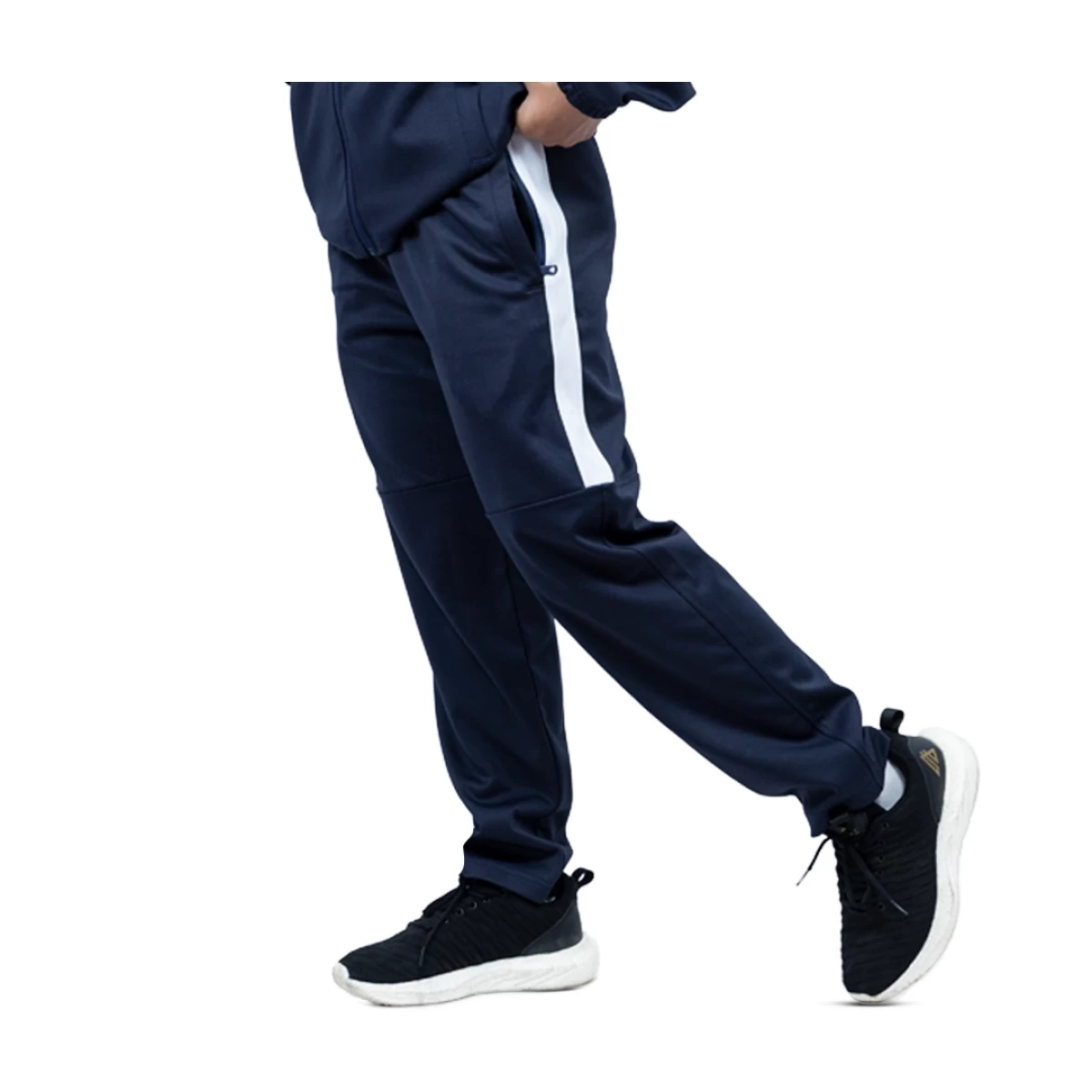 A side-profile view of a person wearing black KTM CTY Strike track pants. The trousers feature a bold white stripe down the upper side of the leg and a horizontal articulated knee seam 2