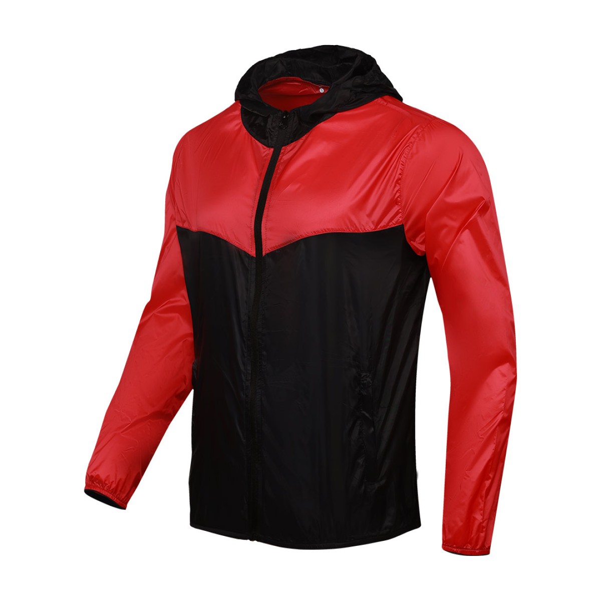 A smiling male model wearing the lightweight SkyShield Windcheater Jacket, featuring a bold red and bright blue color-block design, a full front zipper and an adjustable hood 4