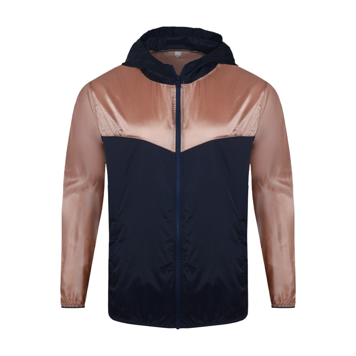 A smiling male model wearing the lightweight SkyShield Windcheater Jacket, featuring a bold red and bright blue color-block design, a full front zipper and an adjustable hood 2