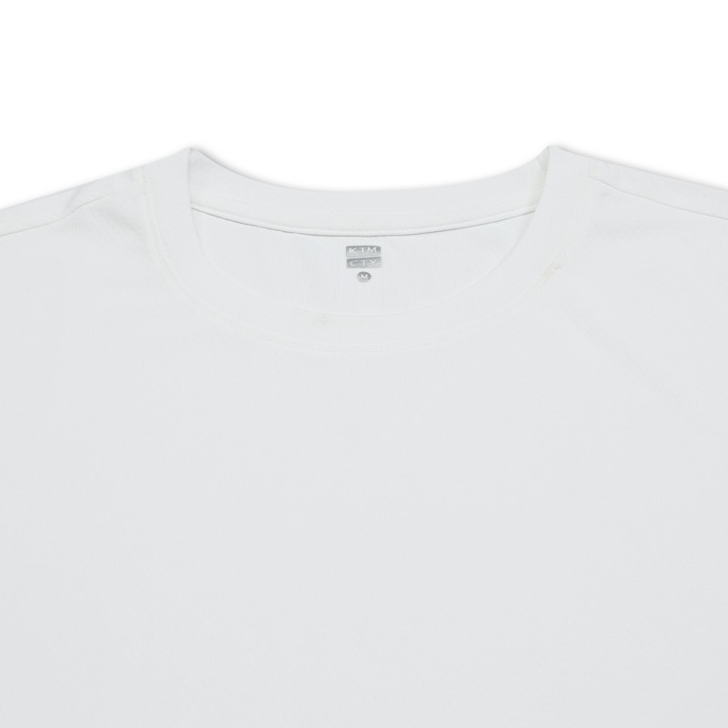A solid white KTM CTY Unisex Half Sleeve crew neck t-shirt featuring a clean, minimalist design with a small discreet logo on the bottom hem. 2