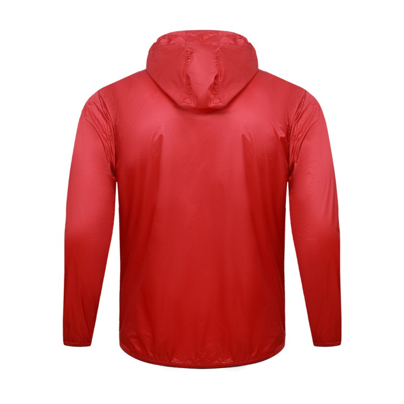 A male model adjusting the zipper of the lightweight, solid red Velocity Breeze Windcheater Jacket with hoodie, featuring a hood and a contrasting black front zipper 4