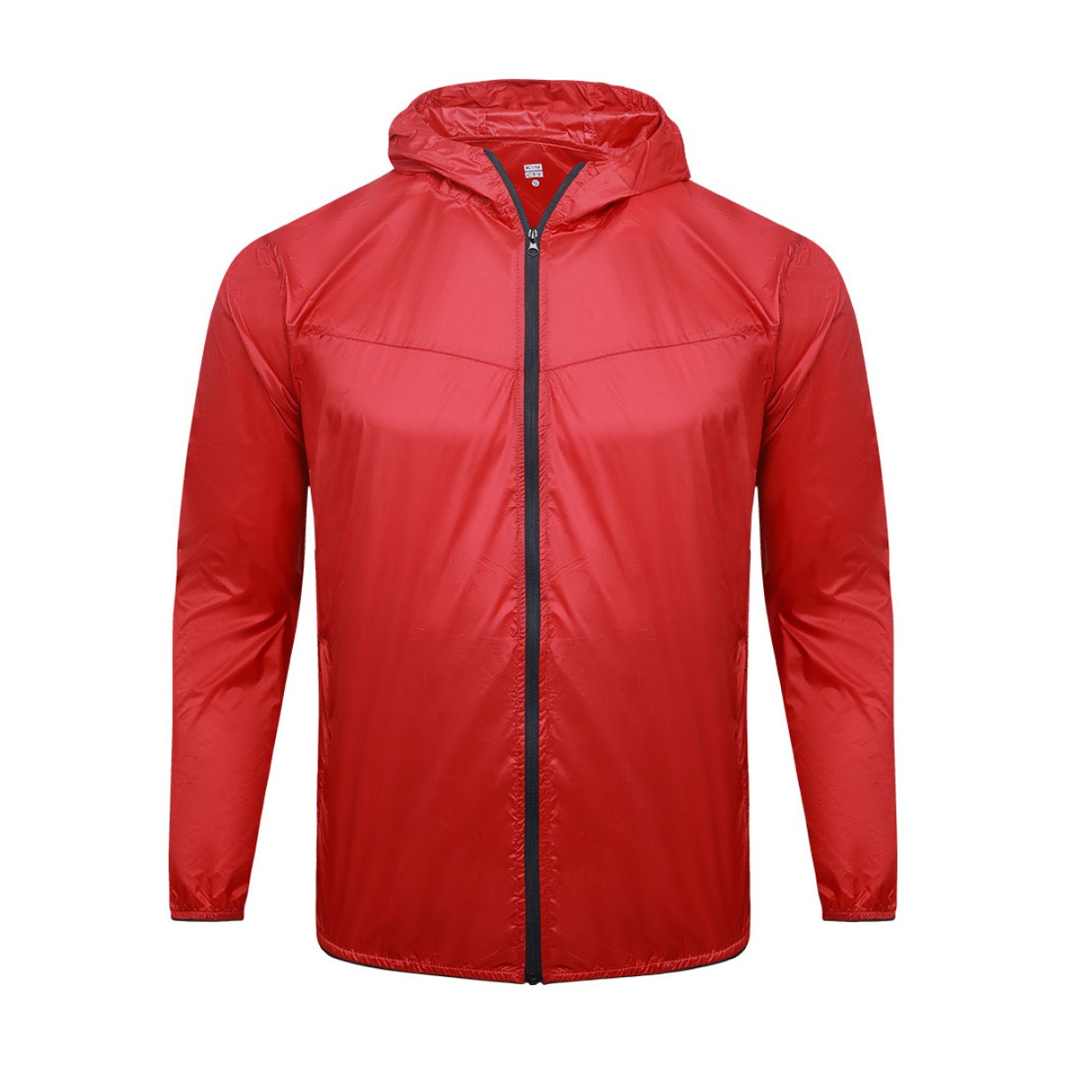 A male model adjusting the zipper of the lightweight, solid red Velocity Breeze Windcheater Jacket with hoodie, featuring a hood and a contrasting black front zipper 2