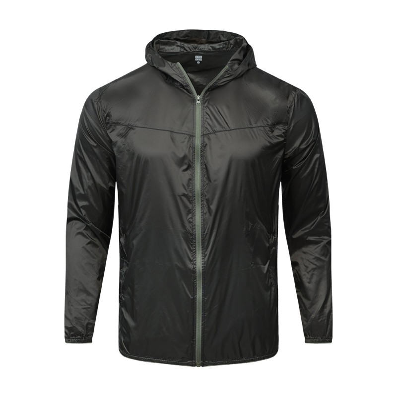 A male model adjusting the zipper of the lightweight, solid red Velocity Breeze Windcheater Jacket with hoodie, featuring a hood and a contrasting black front zipper 3